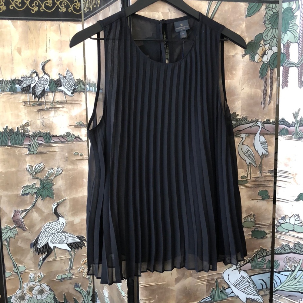 Very cute Solid black…pleated/creased front design top